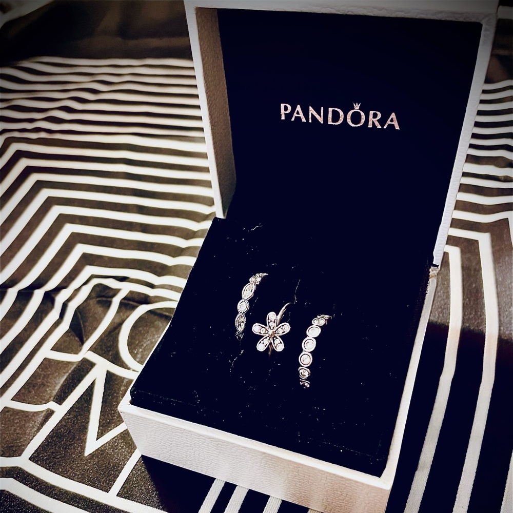 Pandora 2 silver stackable rings. Daisy ring sold out